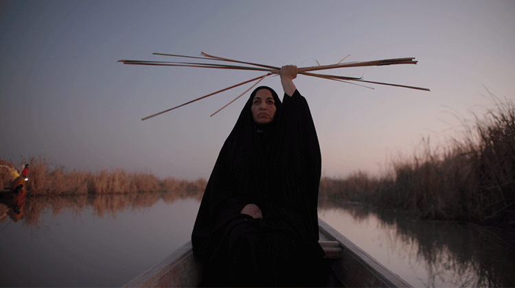 Image of woman in boat.