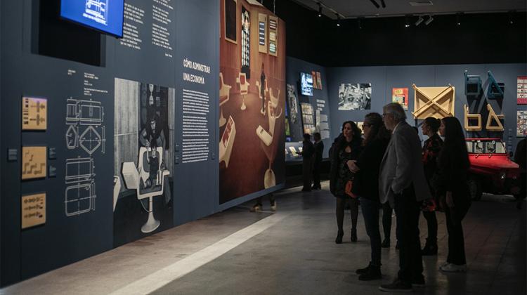 Photo of attendees exploring the exhibition.